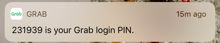 GrabTaxi mobile number verification push notification.